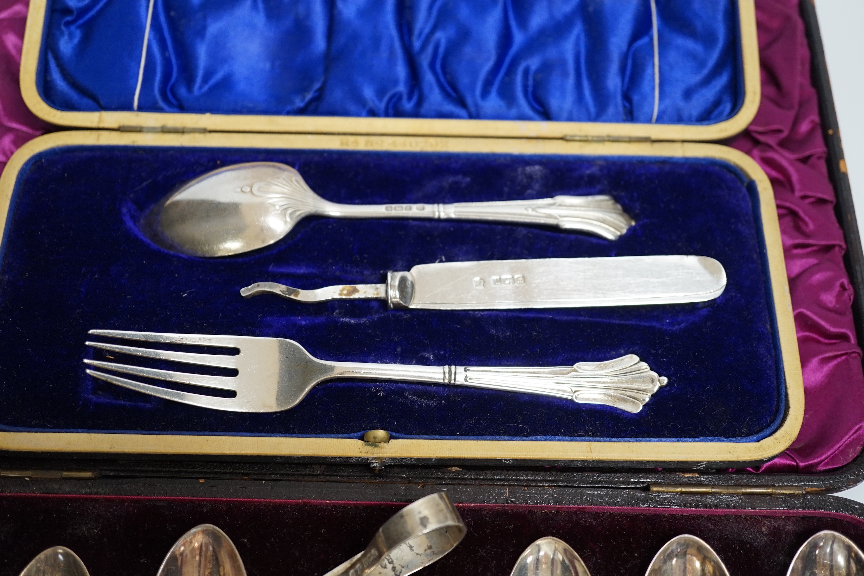 Two sets of six silver teaspoons, fiddle and Old English pattern and other silver or 900 flatware including a cased Christening trio (a.f.).